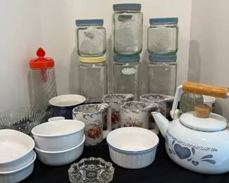 Assorted Kitchen Essentials with a Tang Pitcher