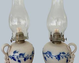 Pair of Salmon Falls vine pattern hurricane lamps