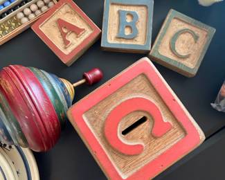 Wood carved ABC blocks & 1 big bank.