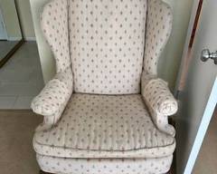 Vintage Queen Anne style wingback armchair.