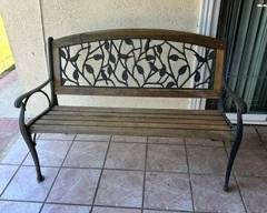 wrought iron & wood bench.