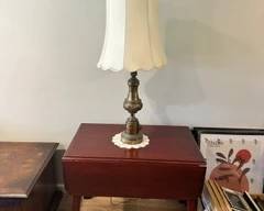 Dark brown mahogany drop leaf table.