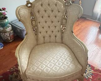 Ornate Carved Giltwood Armchair with Tufted Upholstery
