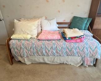 Wooden Daybed with Quilted Bedding
