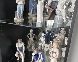 Collection of Lladro Porcelain Figurines, including specific pieces like Boy with Baseball Bat, Girl with Goose, and Boy with Accordion