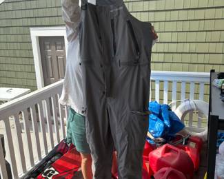 Fishing overalls, water skis and towing rope, lots of boating