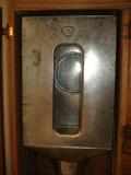 FLOUR SIFTER LOCATED INSIDE HOOSIER CABINET