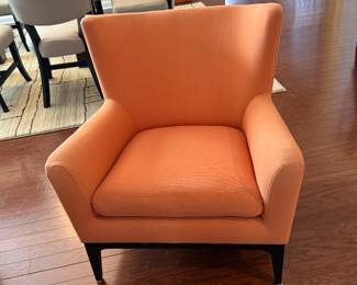 Orange Accent Chair. Some fading on the end of one arm. $40