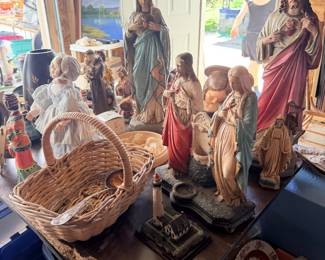 Nativity figures, baskets, and holiday decor