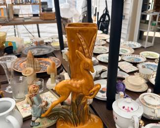 Gold figural vase and glassware