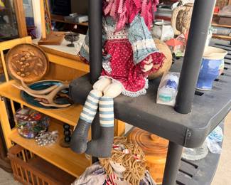 Shelf of decor, baskets, and household accents
