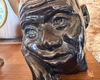 Carved head sculpture