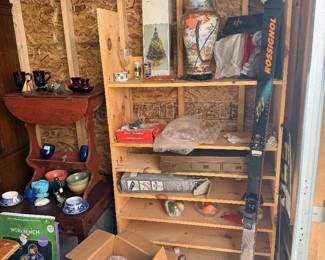 Vintage wood cubby shelf with small collectibles