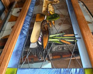 Framed stained glass bird panel