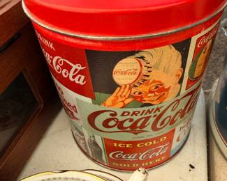 Vintage Coca-Cola advertising tin