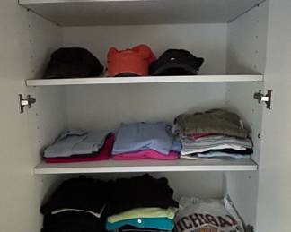 Assorted Hats and Folded Apparel Lot