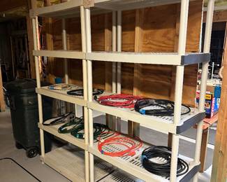Storage shelves and tons of extension cords