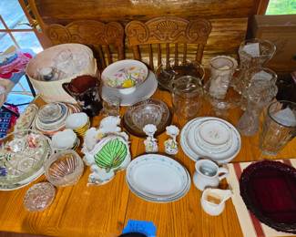 various collectible glassware and ceramics.