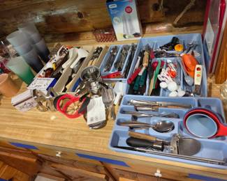 various kitchen utensils and silverware