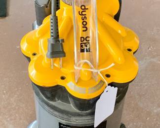 One of two  Dyson vacuum cleaners 