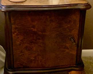 one of two vintage bedside tables