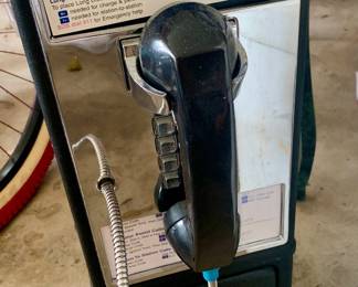 a pay phone--your mom called and said to get to this sale!