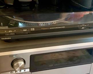 vintage sound equipment including Bose Sound System and Technics turntable