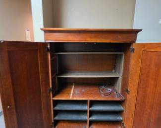 Inside of TV Armoire (has had non-matching shelving added in the upper section) Has s