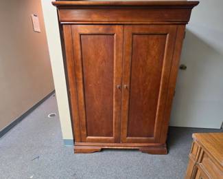 TV Armoire (has had non-matching shelving added in the upper section) Has some finish wear/scratches