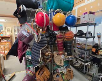 Vintage Catchers gear, Baseball mits and Football helmets