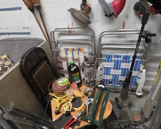 Card Table, Folding Chairs (metal and lawn), sprinklers, plant stand, Tiki Torches