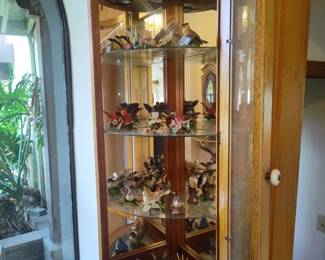 Oak Curio Cabinet with Ceramic Bird Collection