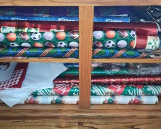Assorted Holiday and Sports Wrapping Paper Rolls