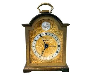 Swiss-made carriage-style alarm clock.  10" Tall