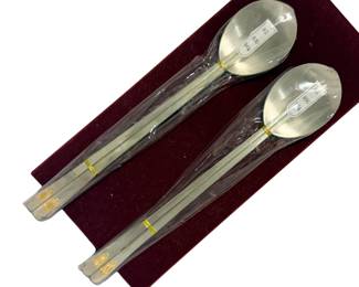 Continental silver Korean long-handled spoons.  Vintage pair of 800 (80% pure silver, 20% alloy) continental silver Korean long-handled spoons (Sujeo), featuring gilded longevity emblems. 188 grams