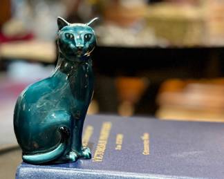 Vintage Poole Pottery glazed cat figurine, made in England features ‘blue dolphin’ teal glaze