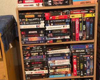 BOOKCASE AND VHS MOVIES TAPES