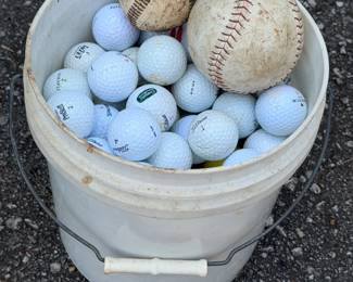 BUCKET OF GOLF BALLS