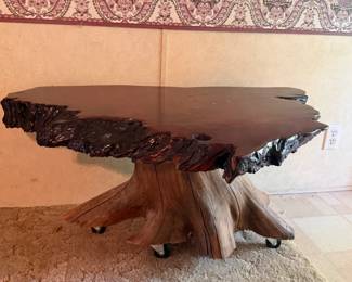 LIVE EDGE WOOD COFFEE TABLE W STUMP BASE & CASTERS