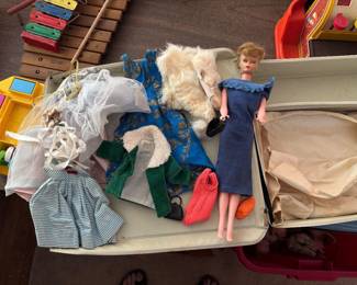 Vintage Barbie with clothes and case