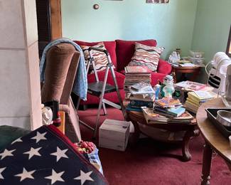 red loveseat, step stool, coffee table