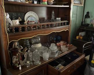 China cabinets/hutch full of glassware
