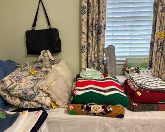 Custom Queen Bedding Matches Custom Drapes, an Assortment of Afghans and Blankets
