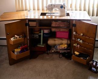 Wooden Sewing Cabinet w/ Machine. $350. 