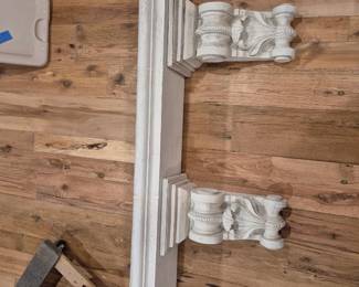 white shelf with corbels