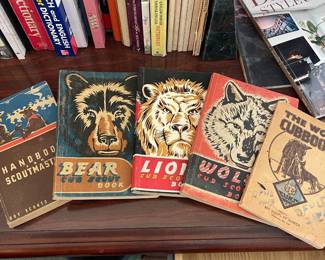 Two generations of scouting books