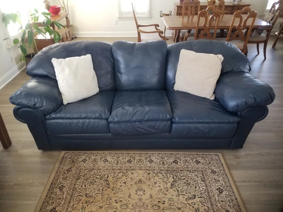 Leather couch; area rug