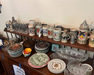 Authentic German steins and decor, as well as decorative plates.