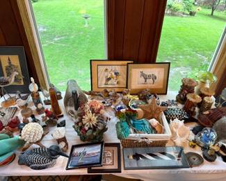Avian collectibles and lighthouse decor