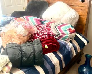 Lots of linens and bedding 
